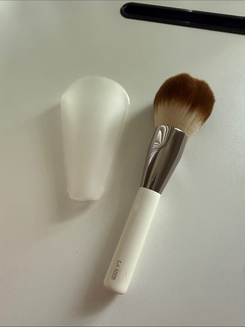 La Mer White Handle Powder Brush with Brown Ombre Bristles